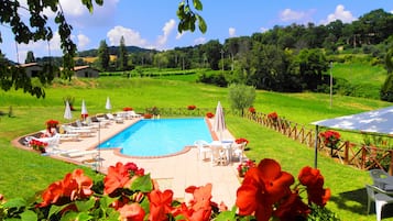 2 outdoor pools, a rooftop pool, pool umbrellas, pool loungers