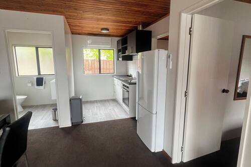 Apartment, 2 Bedrooms (Unit 4) | Living area | Flat-screen TV