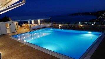 Outdoor pool, pool umbrellas, pool loungers