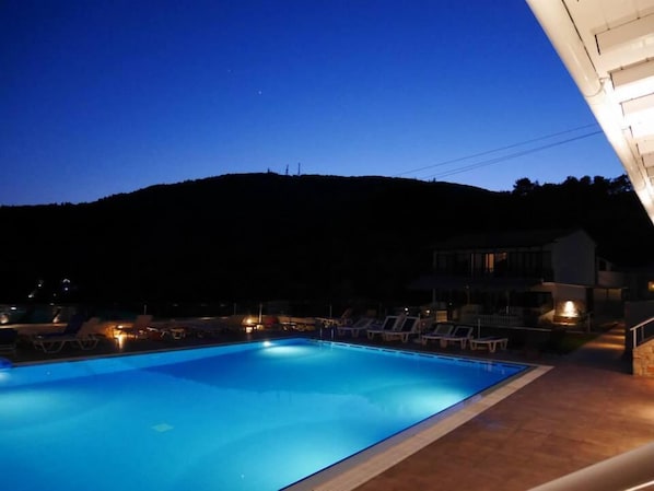 Outdoor pool, pool umbrellas, pool loungers