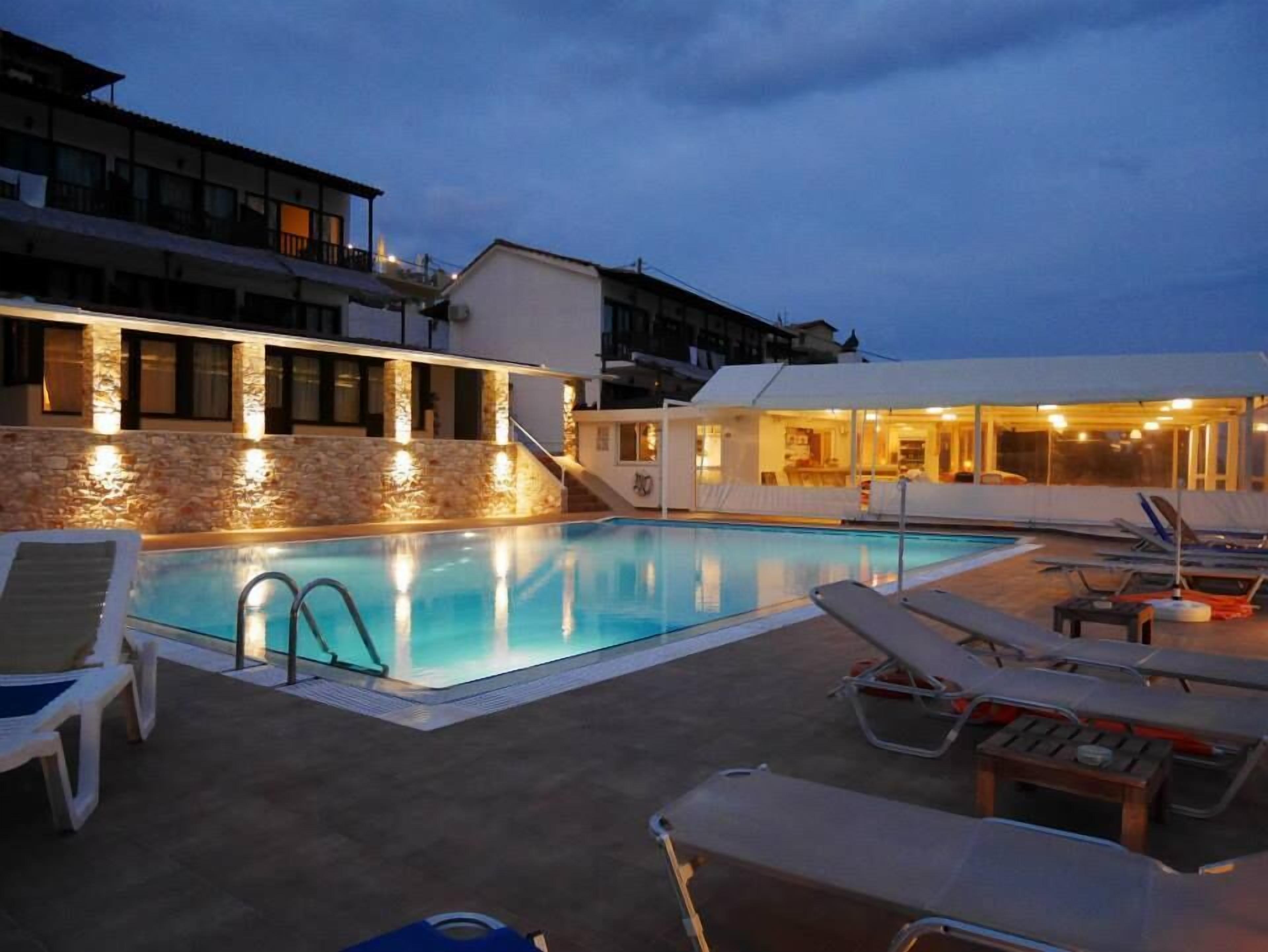 outdoor pool, pool umbrellas, pool loungers