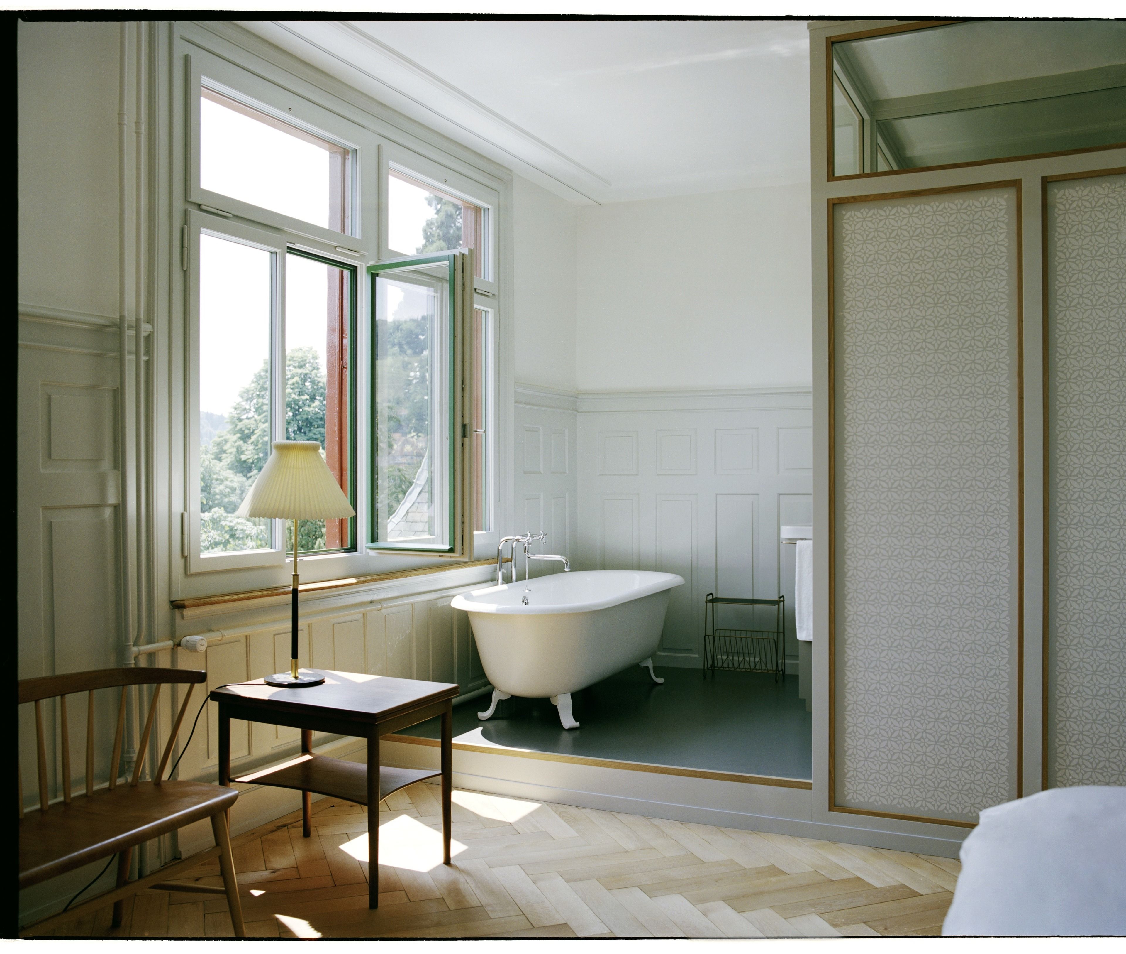 xcomfort room, park view (for 4 people) | living area | ipad