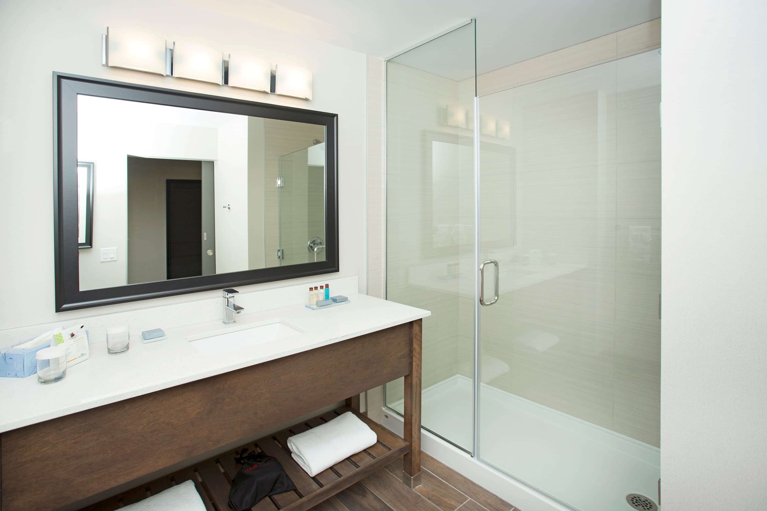 eco-friendly toiletries, hair dryer, dressing gowns, towels