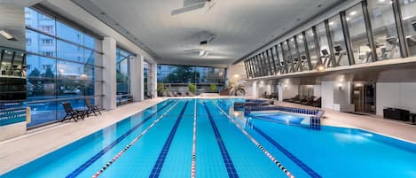 Indoor pool, seasonal outdoor pool, open 6 AM to 9 PM, pool umbrellas