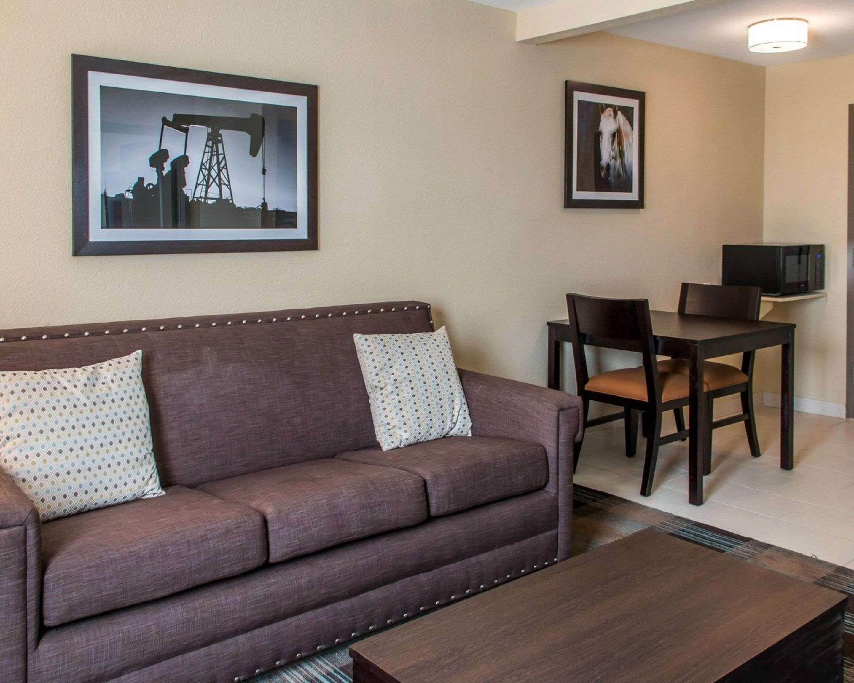 suite, 1 king bed with sofa bed, non smoking (2 person sofa bed) | pillow-top beds, desk, laptop workspace, iron/ironing board