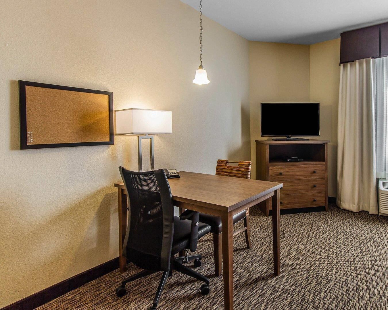 Premium bedding, desk, blackout drapes, iron/ironing board