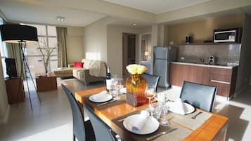 Duplex Apartment | Private kitchen | Fridge, microwave, coffee/tea maker, electric kettle