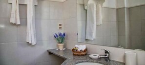 Shower, free toiletries, hair dryer
