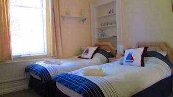 أغطية فراش متميزة ومكواة/لوح كي وواي فاي مجانًا وملاءات أسرّة