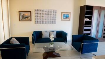 32-inch flat-screen TV with satellite channels, TV