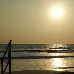 On the beach, sun-loungers