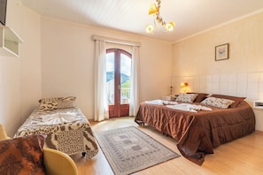Triple Room | Minibar, blackout curtains, free cots/infant beds, free WiFi