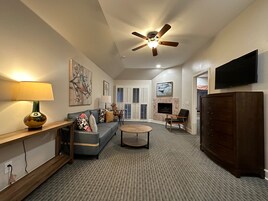 Suite, 1 King Bed, Garden View | Living area | 42-inch flat-screen TV with cable channels, TV, streaming services