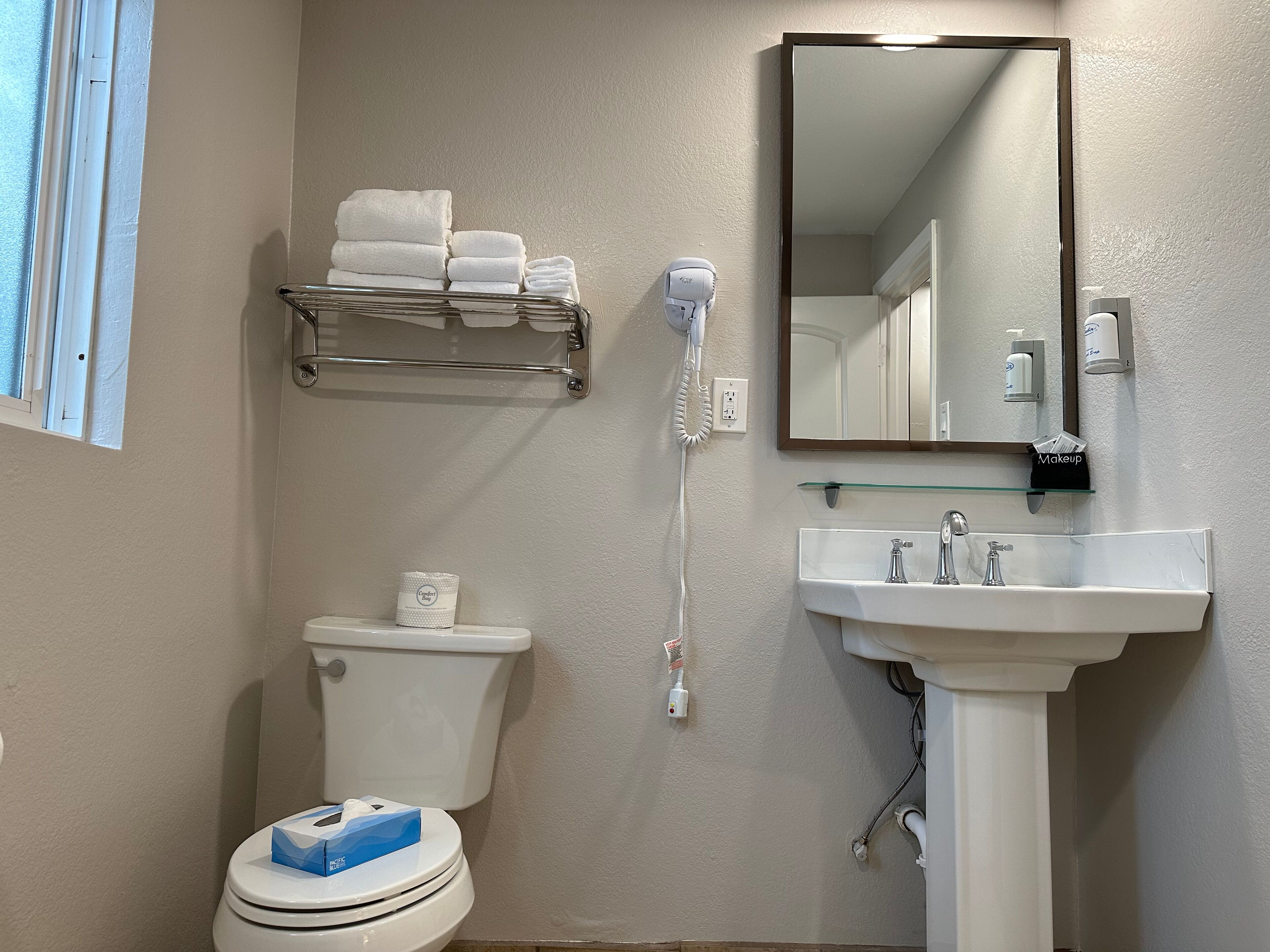 standard room, 2 double beds | bathroom | shower, eco-friendly toiletries, hair dryer, towels