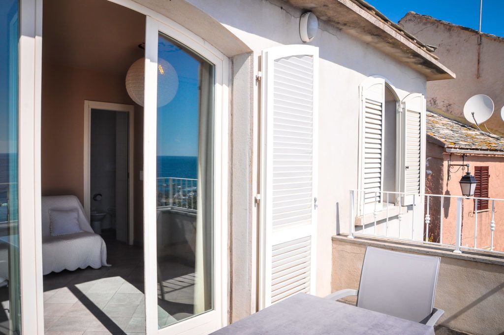 family room, sea view | terrace/patio