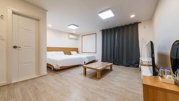 Family Twin Room, 1 Bedroom | Blackout curtains, free WiFi, bed sheets