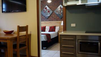 Apartamento, 1 quarto | Ferros/tábuas de passar roupa, Wi-Fi de cortesia