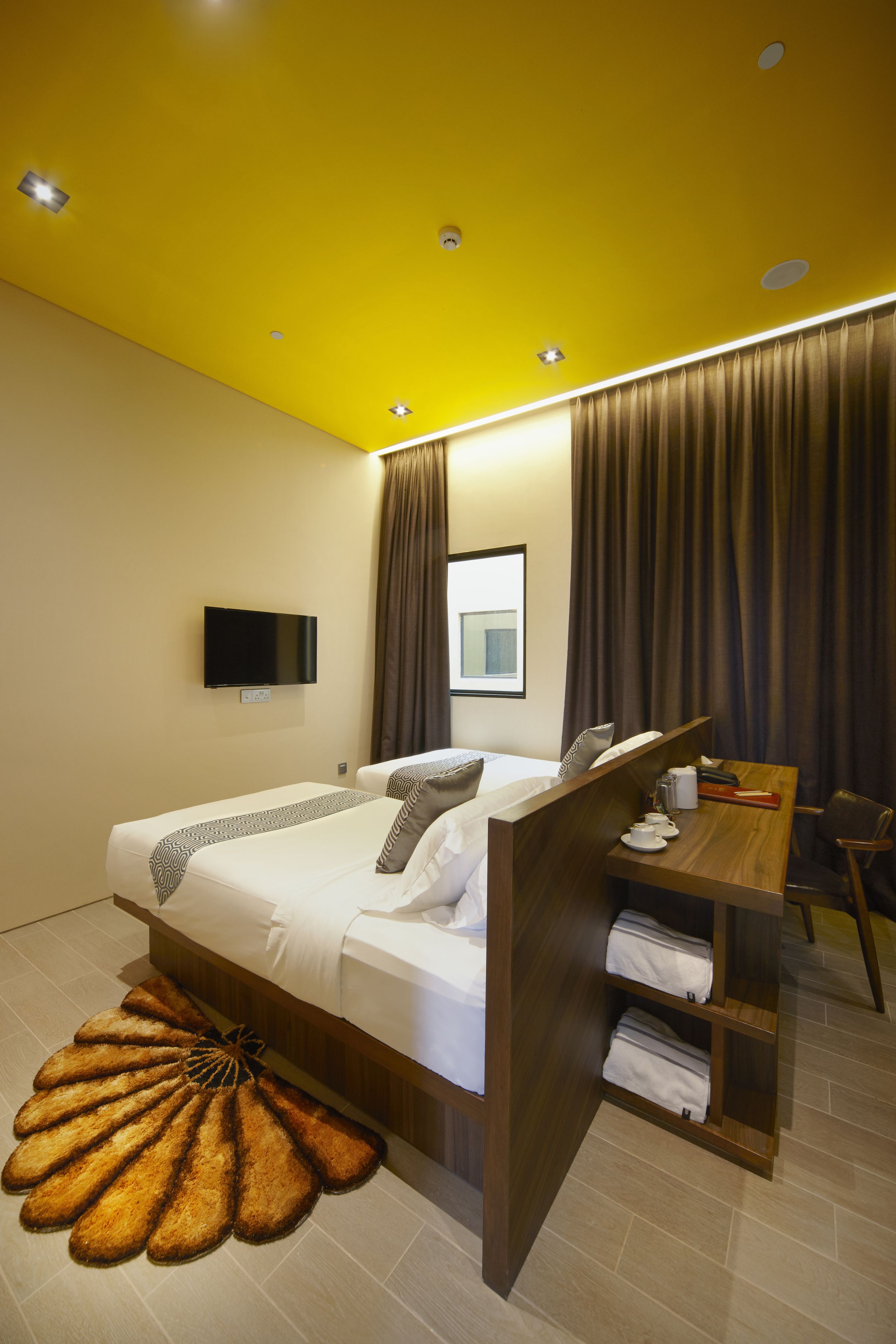 deluxe twin room | free minibar, in-room safe, blackout curtains, free wifi