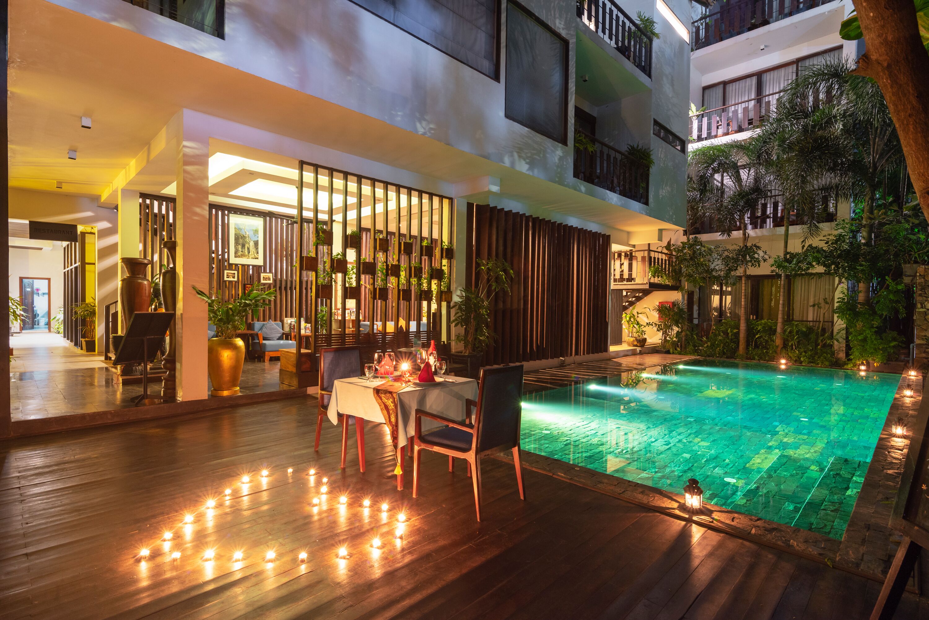 outdoor pool, pool umbrellas, pool loungers