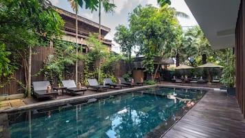 Outdoor pool, pool umbrellas, pool loungers