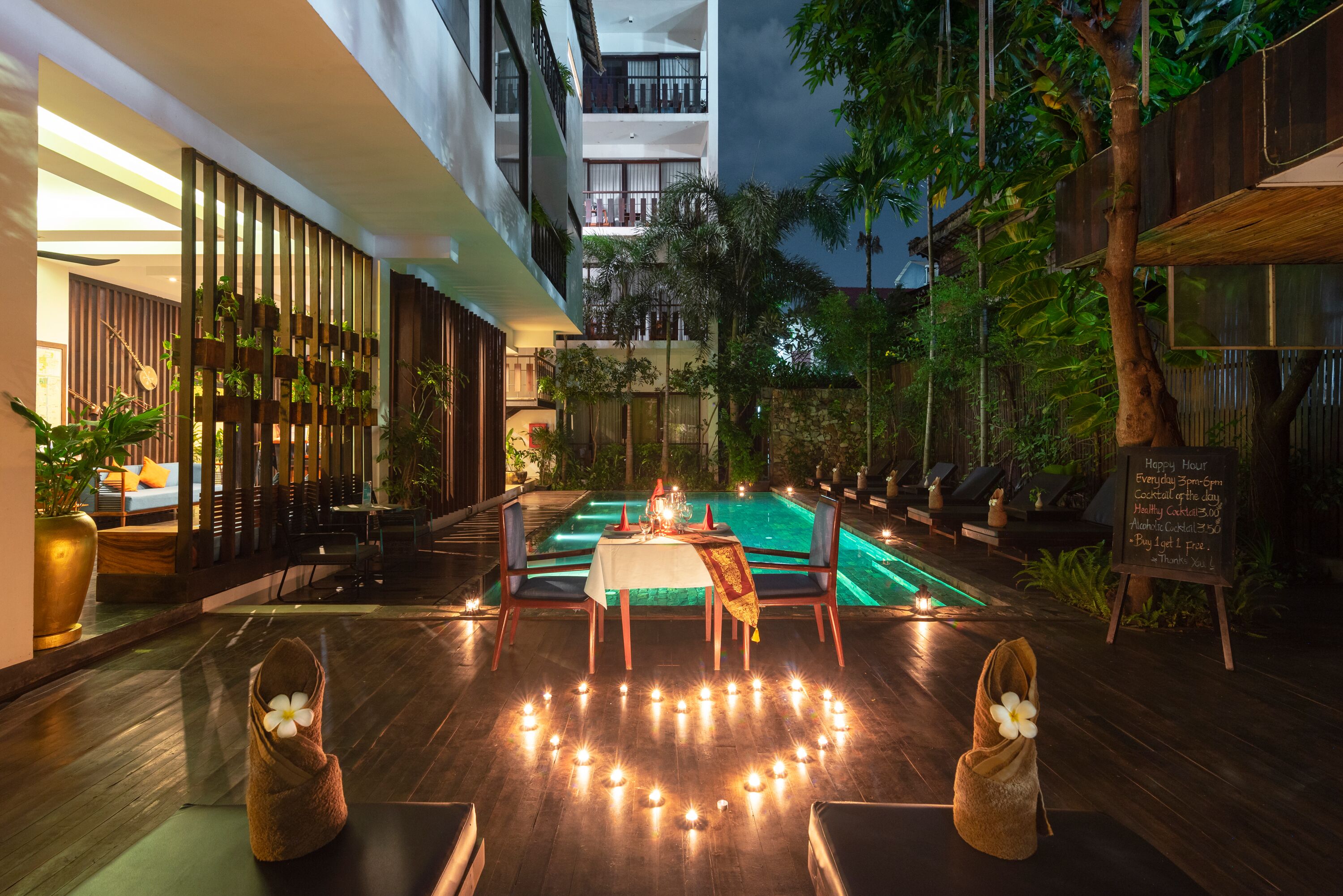 outdoor pool, pool umbrellas, pool loungers