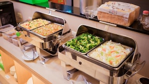 A buffet with various dishes including salads, vegetables, and bread. - Travel Road Hotel (Hualien City)