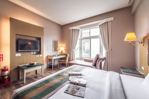 Quarto casal luxo | Roupas de cama premium, frigobar (abastecido com itens grátis)