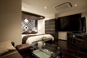 Deluxe-huone | Ylelliset vuodevaatteet, yksilöllisesti sisustettu