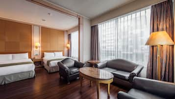 Deluxe Quadruple Room | Premium bedding, free minibar, desk, blackout drapes