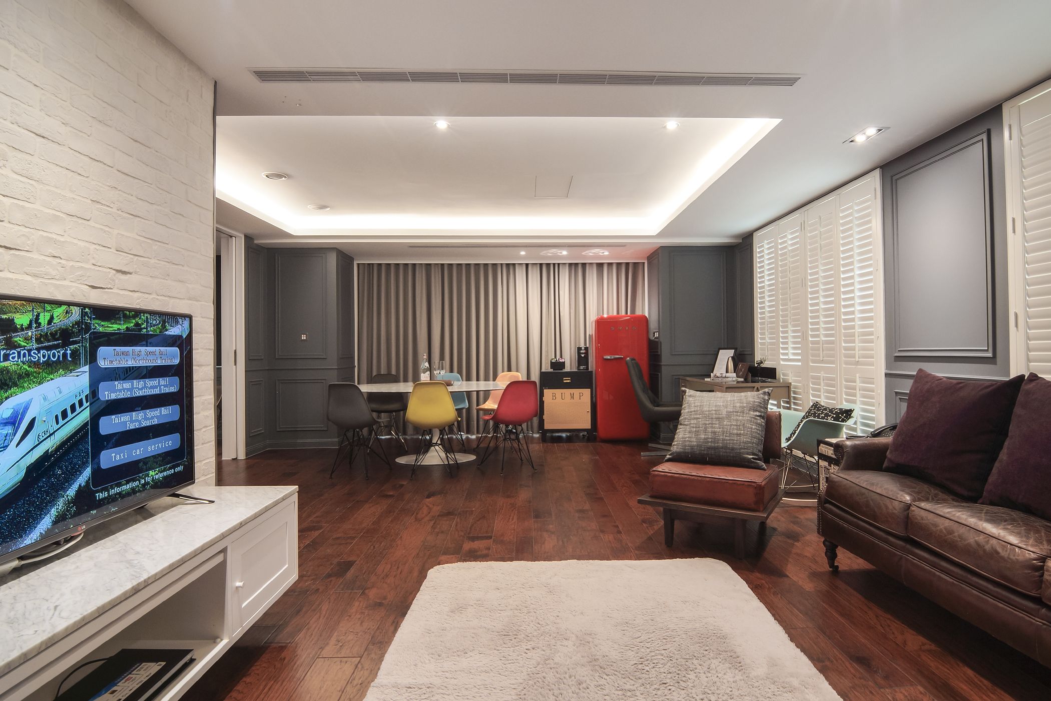 deluxe studio suite, 1 bedroom | living area | flat-screen tv