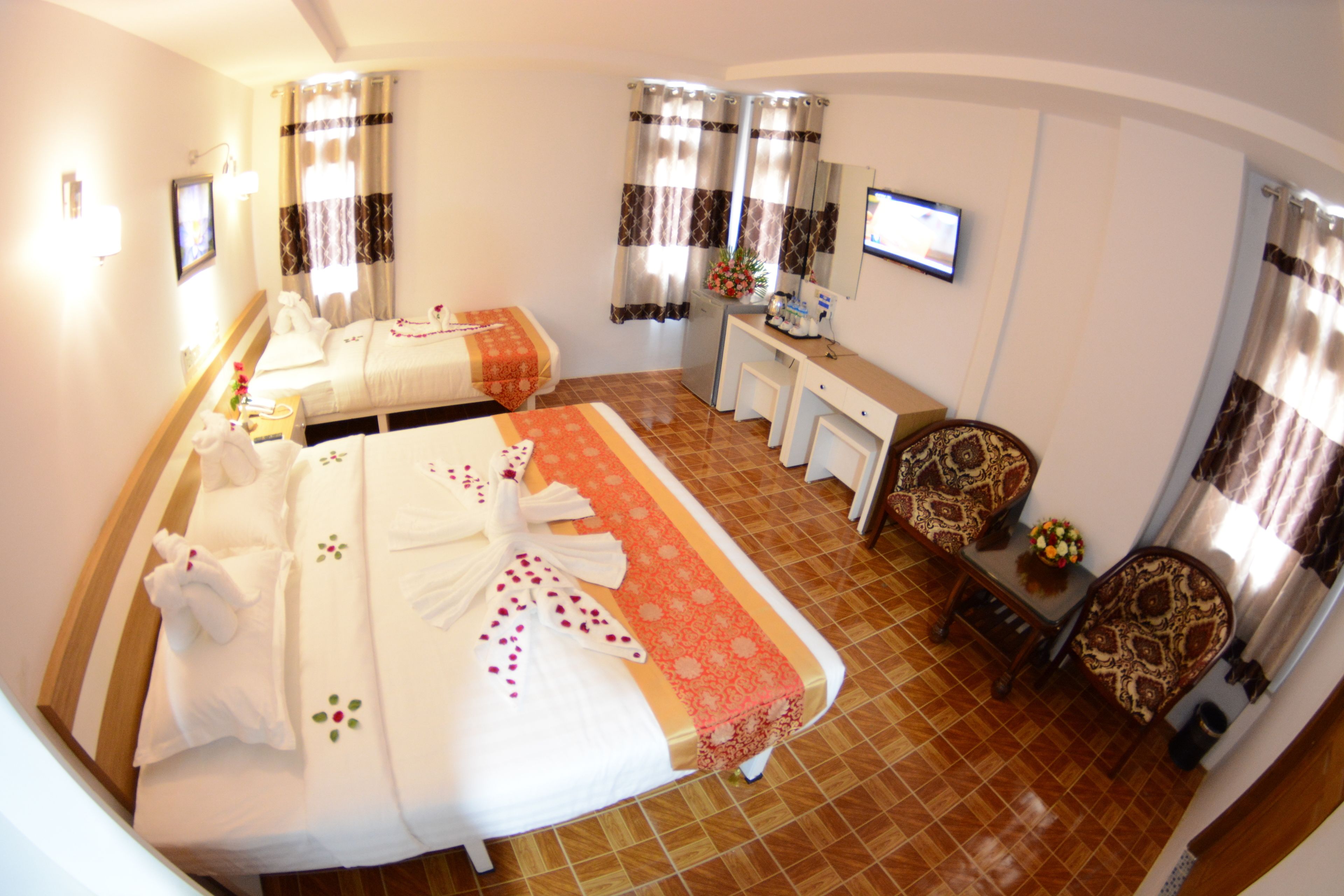 deluxe family room | minibar, desk, blackout curtains, soundproofing