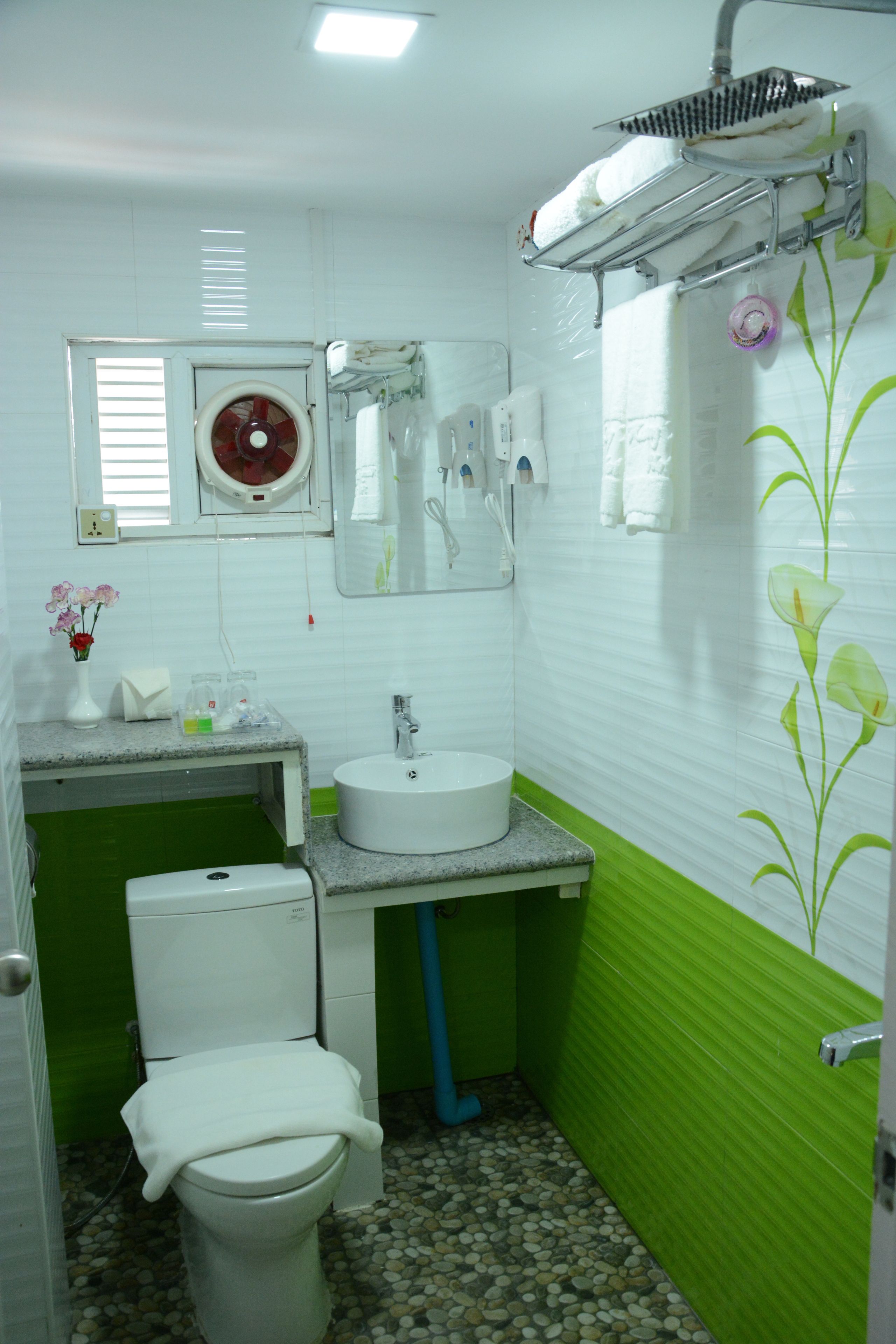 free toiletries, hair dryer, slippers, towels