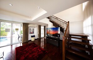 Family Villa, 6 Bedrooms, Private Pool, Pool View | Living area | Flat-screen TV, DVD player - PARADISE Pool Villa Pattaya in Tropicana Village (Pattaya)