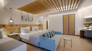 Superior Corner Room | Minibar (free items), in-room safe, desk, laptop workspace