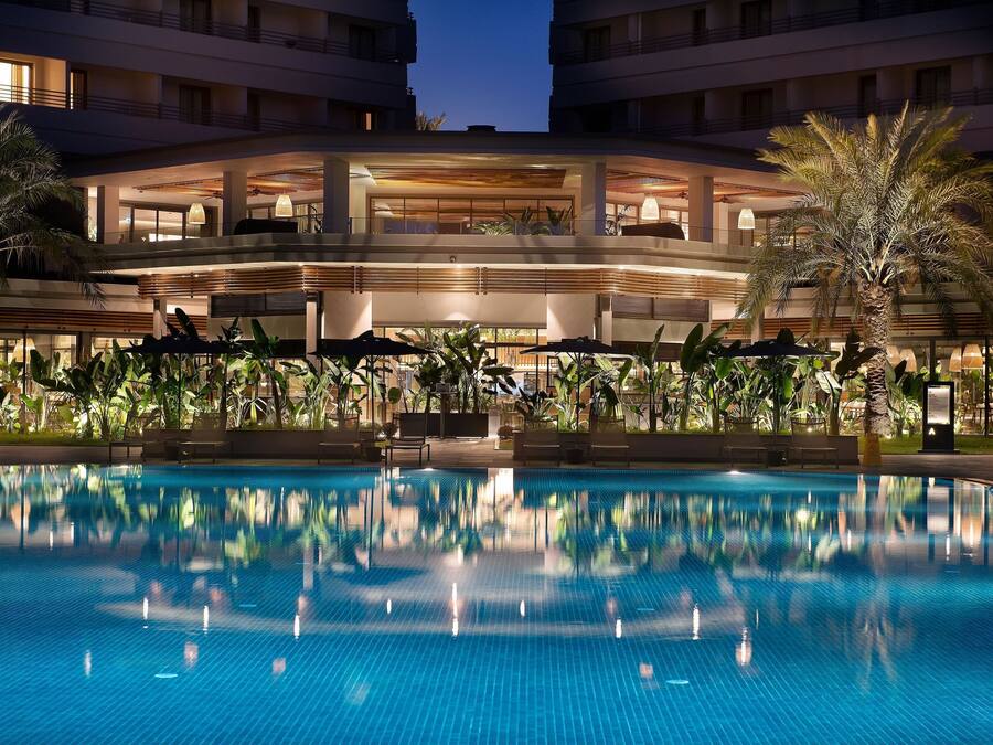 Indoor pool, outdoor pool, pool umbrellas, sun loungers