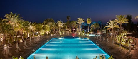 Indoor pool, outdoor pool, pool umbrellas, sun loungers