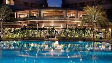 Indoor pool, outdoor pool, pool umbrellas, sun loungers
