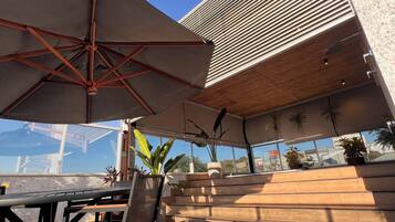 Suíte Master Casal - 1 Cama King | Área de estar