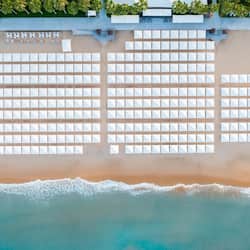 On the beach, sun loungers, beach umbrellas, beach towels