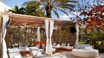 Outdoor pool, open 7:00 AM to 11:00 PM, cabanas (surcharge)