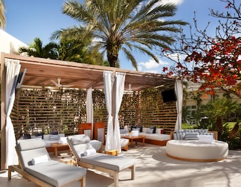 Outdoor pool, open 7:00 AM to 11:00 PM, cabanas (surcharge) at Hilton West Palm Beach