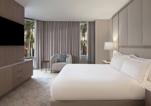 Suíte júnior, 1 cama King | Área de estar | TV LCD