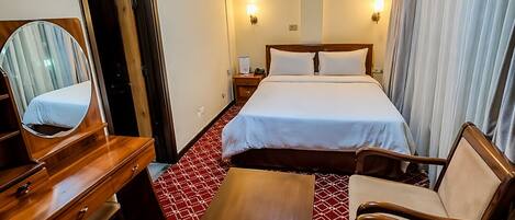 Habitación estándar | Ropa de cama de alta calidad y camas con efecto memoria