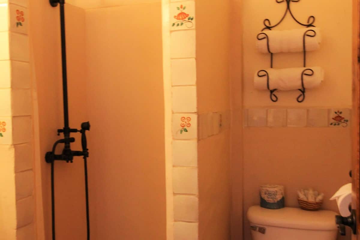 classic room, 1 king bed | bathroom | free toiletries, hair dryer, towels