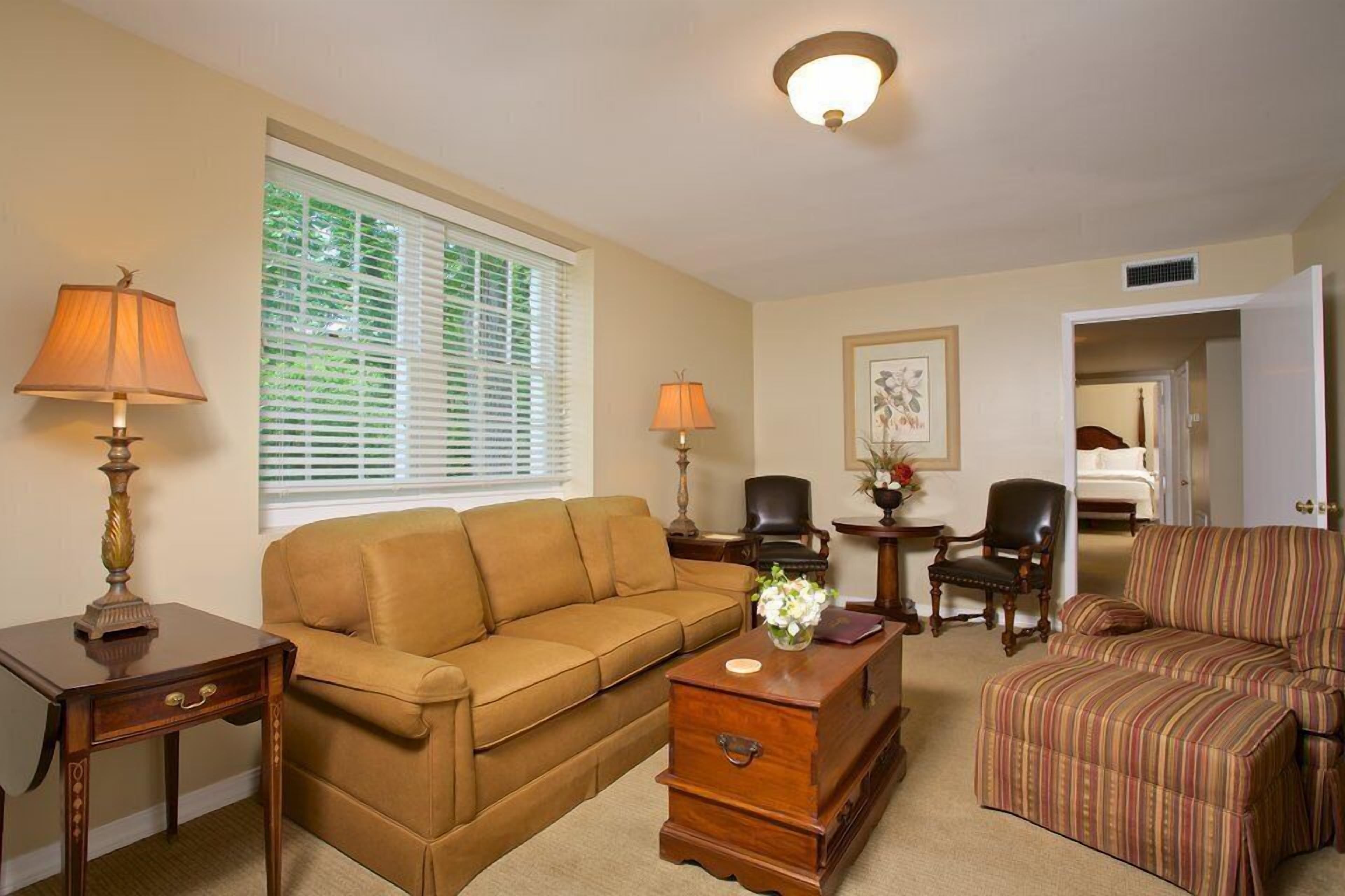 Suite, 1 Queen Bed with Sofa bed | Living area | 0-inch TV with cable channels