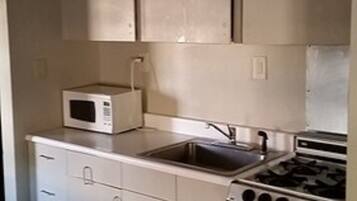 Budget Double Room, Separate Seating Area, 2 Double Beds | In-room dining