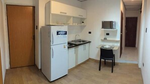 Standard Apartment | Private kitchen - Acosta Ñu Apart Hotel (Asunción)