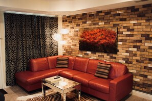 Deluxe Condo, 1 King Bed, Jetted Tub (No Stairs, Kitchenette) | Living room | 46-inch LCD TV with cable channels, TV