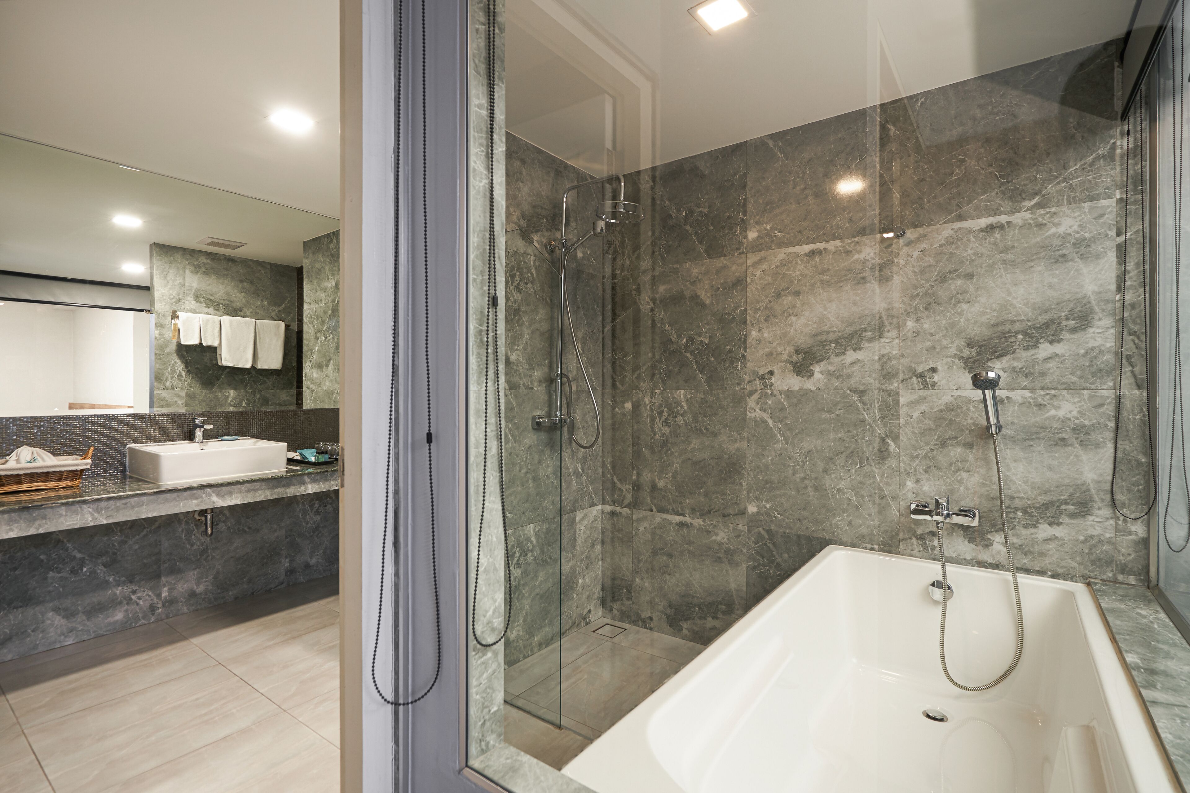 2 bedroom family suite mountain view | bathroom | shower, free toiletries, hair dryer, slippers