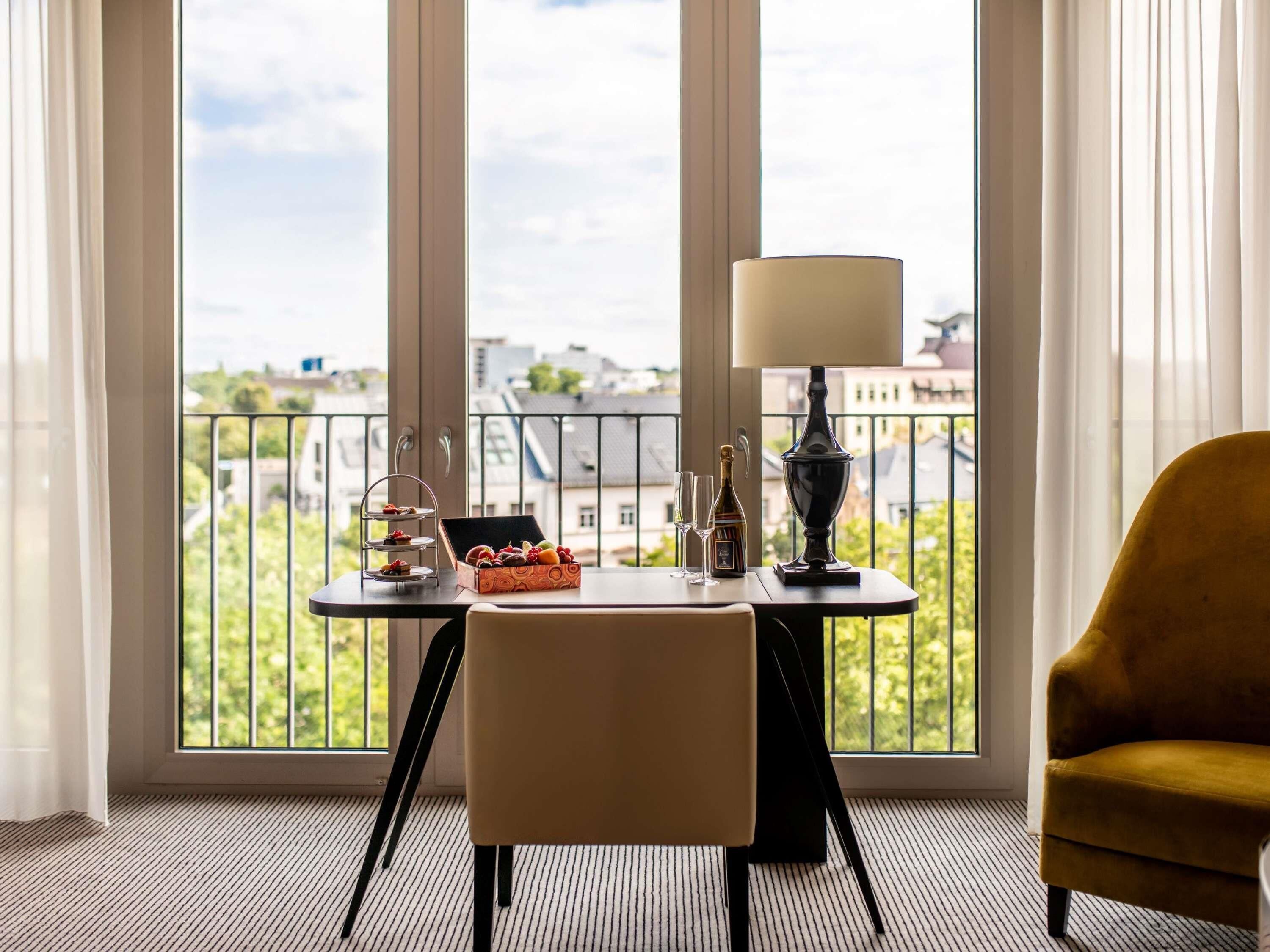 Premium bedding, pillow-top beds, minibar, in-room safe